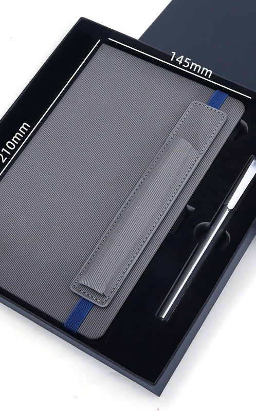 Grey vegan leather notebook and metal pen in gift box